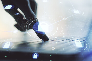 Aufkleber - Creative idea concept with lock symbol and microcircuit illustration and hands typing on laptop on background. Protection and firewall concept. Multiexposure