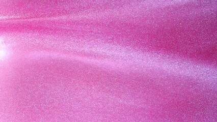 Wall Mural - slow motion of floating white particles in pink liquid. white glowing dust particles abstract motion