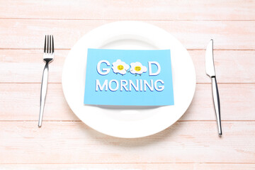 Wall Mural - Table setting and card with text GOOD MORNING on light wooden background