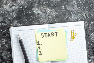 Wall Mural - top view start note with copybook and pen on gray background study paper school lesson student note 