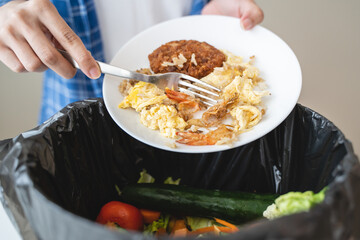 people put bio trash from food waste in domestic homes to compost bins to make fertilizer to reduce global environmental pollution.