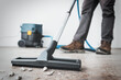Professional construction cleaning service with powerful vacuum cleaner.