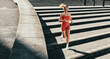 © Jacob Lund - Female runner burning calories with a cardio workout