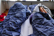 © Alexander - Copenhagen, Denmark  A couple as house guests sleep on air mattress in an apartment.
