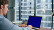 © stockbusters - Closeup businessman using chroma key laptop. Boss working mockup screen computer
