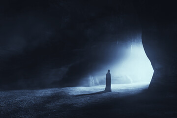 Wall Mural - dark cave with mysterious silhouette standing in front of the exit
