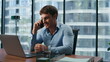 © stockbusters - Closeup positive entrepreneur talking cell phone. Overjoyed businessman call