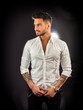 © theartofphoto - Handsome young man with elegant shirt in studio