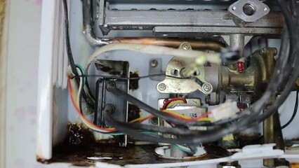 Poster - leaking gas water heater. broken gas equipment
