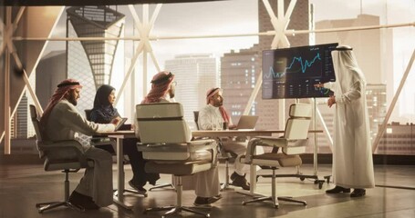 Aufkleber - Diverse Muslim Office Conference Room: Middle Eastern CEO Makes a Presentation for Entrepreneurs, Talking, Using TV with Infographics and Statistics. Businesspeople Talk About an Ecommerce Startup