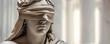 Illustration of blindfolded Lady Justice. Close up visage of a sculpture of lady justice, blindfold impartiality. Space for text, light theme background, isolated. Generative AI and 3D
