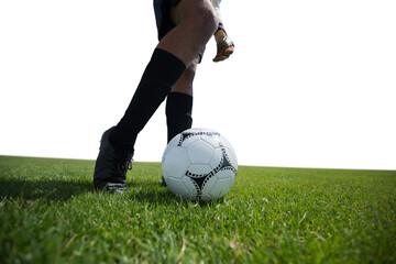 Male soccer player playing football