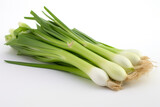 Fototapeta Do akwarium - A bunch of green onions on a white background
