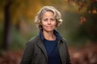 © Robert MEYNER - Portrait of a beautiful middle-aged woman in the autumn park