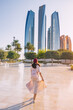 © EdNurg - Revel in the beauty of Abu Dhabi's breathtaking architecture and multicultural vibrancy, embodied by the elegant figure of an Indian woman.