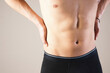 © Designpics - Close-up of Young Man Underwear with Hands on Hips in Studio