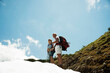 © Designpics - Mature couple hiking in mountains, Tannheim Valley, Austria