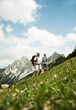 © Designpics - Mature couple hiking in mountains, Tannheim Valley, Austria