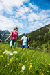© Designpics - Couple Hiking, Vilsalpsee, Tannheim Valley, Tyrol, Austria