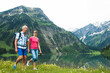 © Designpics - Mature couple hiking in mountains, Lake Vilsalpsee, Tannheim Valley, Austria