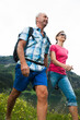 © Designpics - Close-up of mature couple hiking in mountains, Lake Vilsalpsee, Tannheim Valley, Austria