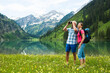 © Designpics - Mature couple hiking in mountains, Lake Vilsalpsee, Tannheim Valley, Austria