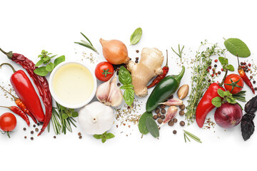 Composition with bowl of oil, spices, herbs and vegetables on white background