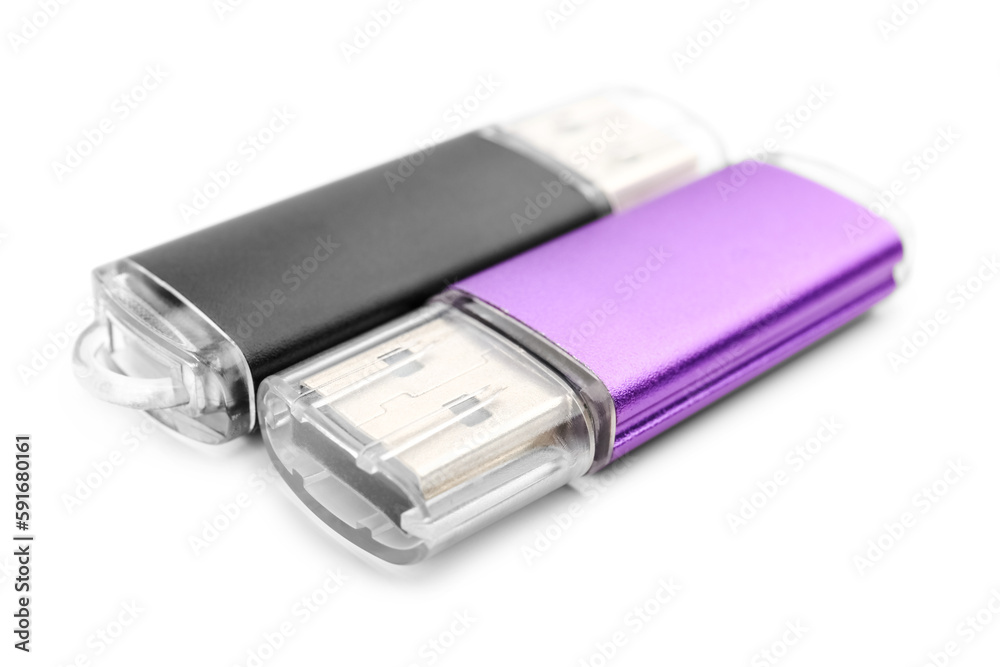USB flash drives on white background