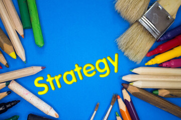 Poster - Overhead shot of school supplies with Strategy text. Brushes, pencils, artistic tools. Art And Craft Work Tools.