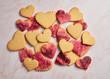 © The Picture Pantry - Stamped Heart Cut-Out Cookies with Pink Sugar on a Pink Marble Background