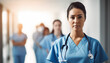 © Danny - Confident Female Healthcare Worker in Blue Scrubs