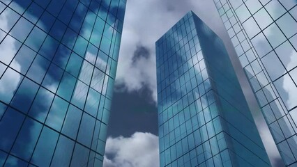 Poster - Animation of low angle view of tall buildings against clouds in the sky
