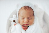 Fototapeta  - Newborn baby girl closeup portrait