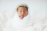 Fototapeta  - Newborn baby girl in flower