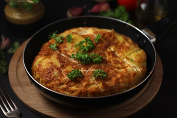 Wall Mural - Traditional Spanish dish tortilla on the table