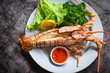 spiny lobster food on plate, fresh lobster or rock lobster seafood with herb and spices lemon coriander parsley lettuce salad, lobster for cooking food and seafood sauce