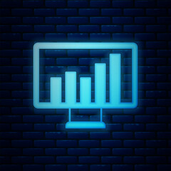 Poster - Glowing neon Computer monitor with graph chart icon isolated on brick wall background. Report text file. Accounting sign. Audit, analysis, planning. Vector