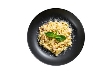 Orzo pasta with cream sauce, bacon and Basil. Prepared risoni.  Isolated, transparent background