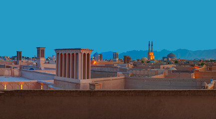 Wall Mural - One of the most attractions of Iran or Yazd city is its Jame Mosque (Friday Mosque) at dusk - Yazd, Iran - UNESCO World Heritage Site 