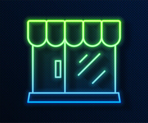 Poster - Glowing neon line Barbershop building icon isolated on blue background. Vector