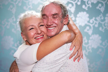 Close Up Portrait Happy, Affectionate Senior Couple Hugging