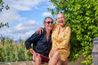 © Caia Image - Portrait happy, carefree senior couple laughing on sunny summer patio