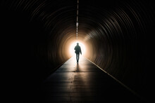 Person Walking Towards To The Light At The End Of Tunnel. AI Generative Image.