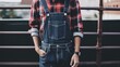 © Наталья Евтехова - A classic plaid shirt paired with denim overalls Generative AI