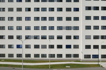 facade of a white building with windows ... 