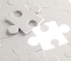 Wall Mural - Close-up of a white jigsaw puzzle piece