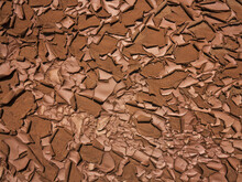 Textured Surface Of Dry Cracked Peeling Mud; Hanksville, Utah, United States Of America