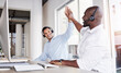 © Jessica L J/peopleimages.com - Call center, happy men and high five of teamwork, success and celebrate winning telecom deal. Motivation, telemarketing and celebration of sales target, business achievement and bonus trading goals