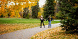 © Designpics - Two teenagers rollerblading together in a city park during a warm fall afternoon; St. Albert, Alberta, Canada