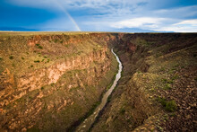 Rainbow Shines Above The Rio Grande In Taos, New Mexico, USA; Taos, New Mexico, United States Of America